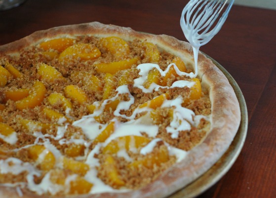 Icing on Peach Crumble Dessert Pizza